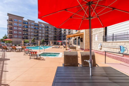 our apartments have a pool and lounge area with umbrellas
