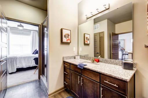 Spacious Bathroom with Modern Cabinets and Granite Countertops | Nashville, TN | 909 Flats