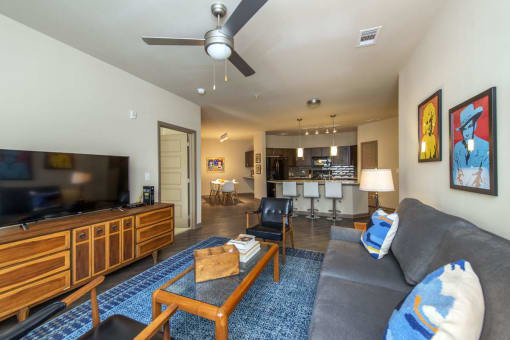 a living room with a couch and a tv