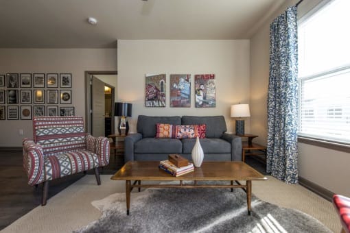 a living room with a couch and a table