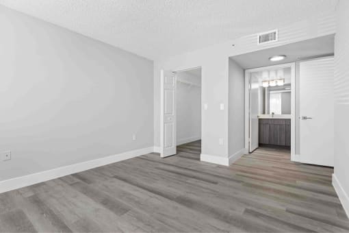 our apartments offer a spacious living room with wood flooring