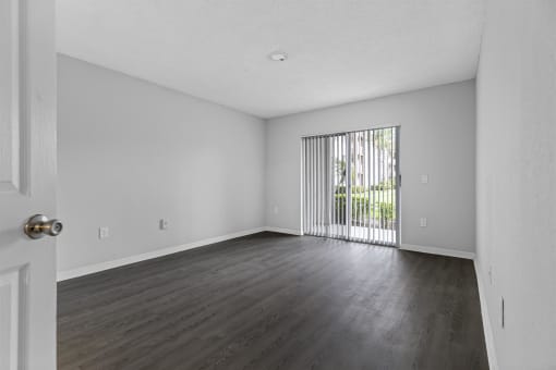 Open concept floor plans with large windows, vinyl wood flooring throughout, stainless steel kitchens, upgraded lighting with white and wood accents
