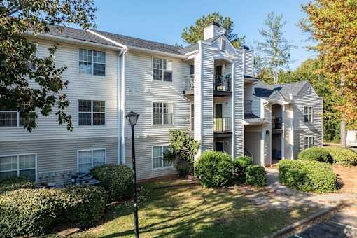 A large apartment complex with a mix of single and two-story buildings.