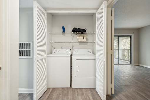 A laundry room with a washer and dryer.