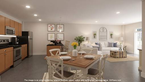 A modern kitchen with a dining table set for two.