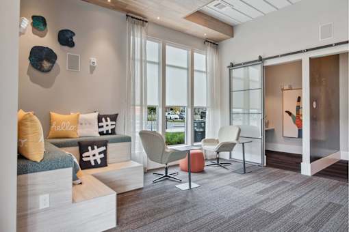 Apartments in Nashville TN - The Sound at Pennington Bend - Clubroom featuring comfortable seating and private co-working spaces