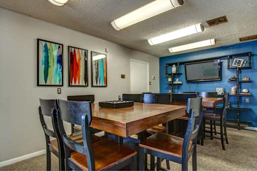 Clubroom with conference table and TV