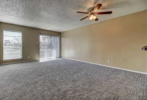 Living room with private patio and cable ready