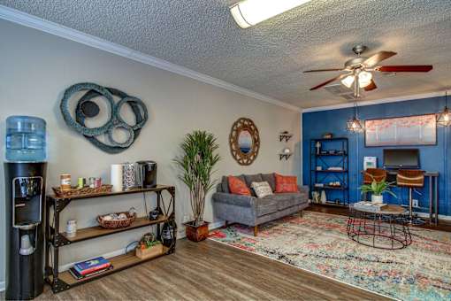 Resident Clubroom with couch seating and computer desk