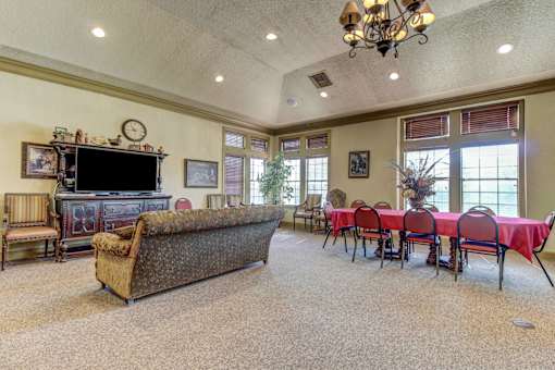 Clubhouse with couch seating and TV