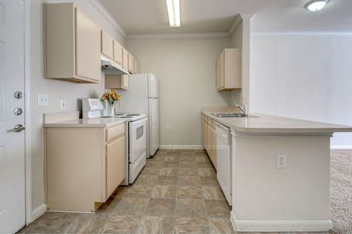Kitchen with island and high ceilings
