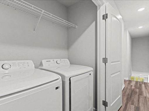 A laundry room with a washer and dryer.