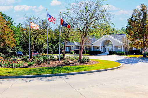 A building with a flagpole in front of it.