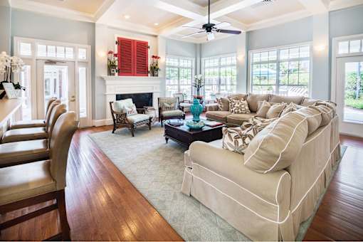 A living room with a fireplace and a couch.