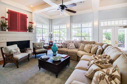 A living room with a fireplace and a couch.