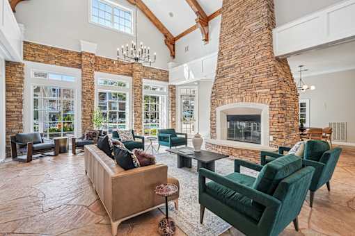 A living room with a fireplace and a couch.