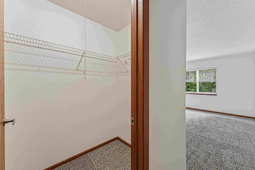 A room with a door and a window.