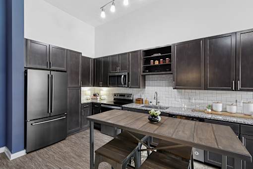 Luxury Apartments in Germantown Nashville TN - Peyton Stakes - Kitchen with Stainless Steel Appliances, and Granite Counters.