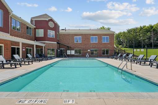 A pool with the words "No Diving" and "GFT" on the ground.