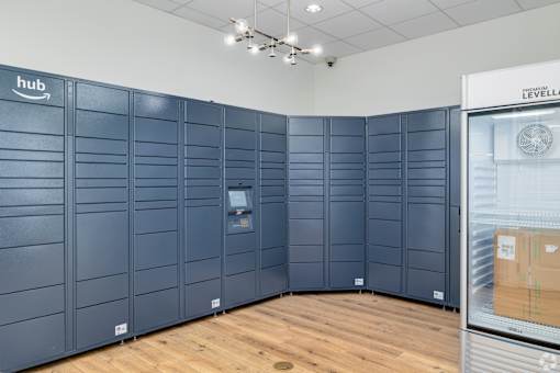 A room with a wall of lockers and a sign that says hub.