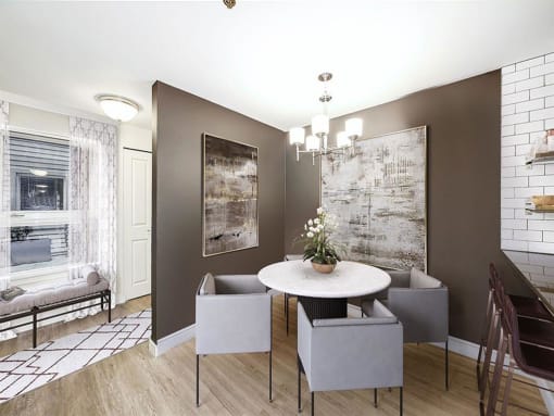 a dining room with a table and chairs