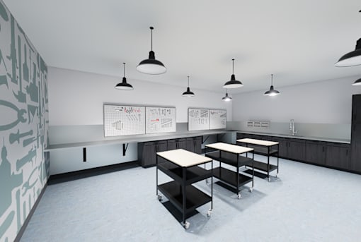 A classroom with a whiteboard and several tables.