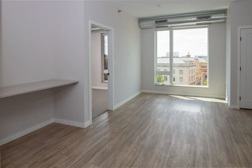 Open Layouts with Wood Flooring, Large Windows at Kesler Apartments in Downtown Fargo, Fargo ND 58102