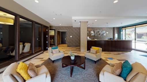 A living room with a fireplace and a couch.