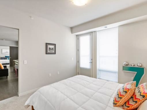 a bedroom with a bed and a large number 7 on the wall