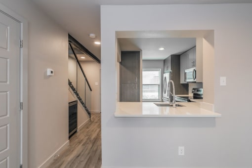 Dining nook beside kitchen in modern Dallas apartment