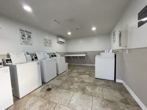 the laundry room is equipped with washes and dryers
