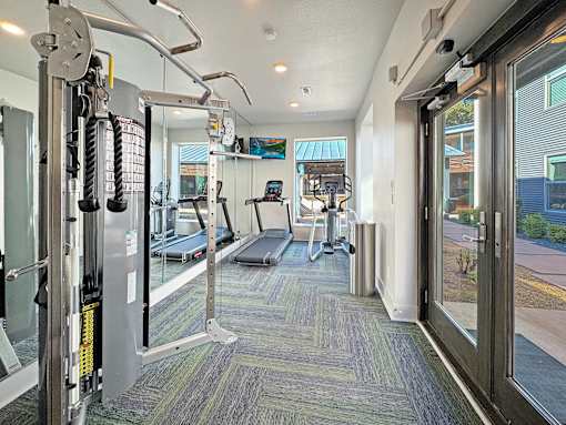 24-hour fitness center with cardio and strength equipment at Reserve on Abrams