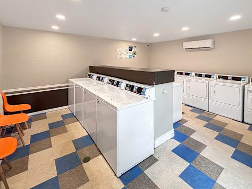 A laundry room with a washer and dryer.