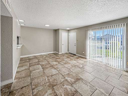 Large dining room with tile flooring – Borders Apartments Brownsville TX