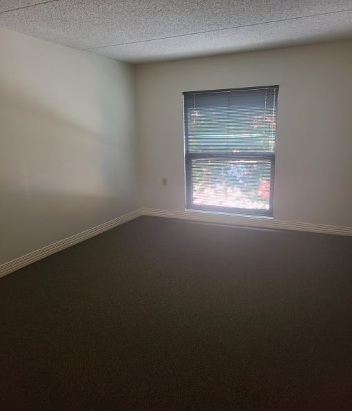 an empty room with a window