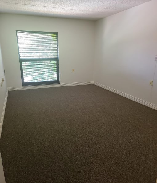an empty room with a window