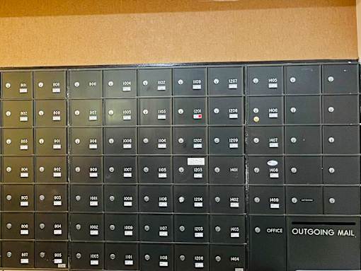 A wall of mailboxes with one labeled 1404.