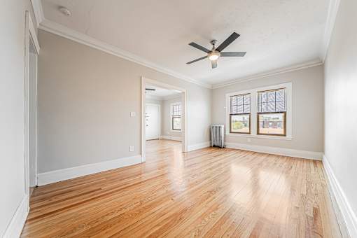 Dining room with hardwood floors and a ceiling fan. at Integrity Gold Coast Apartments, Ohio
