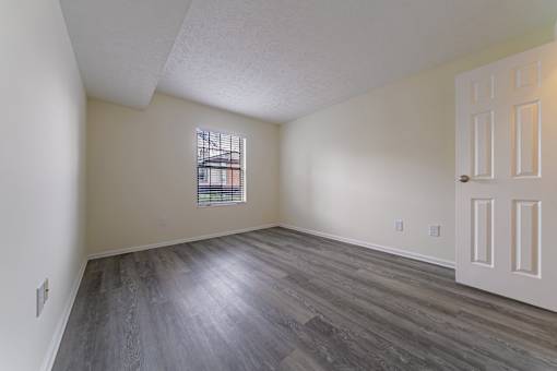 A room with a window and a door at Hunt Club Apartments, Ohio