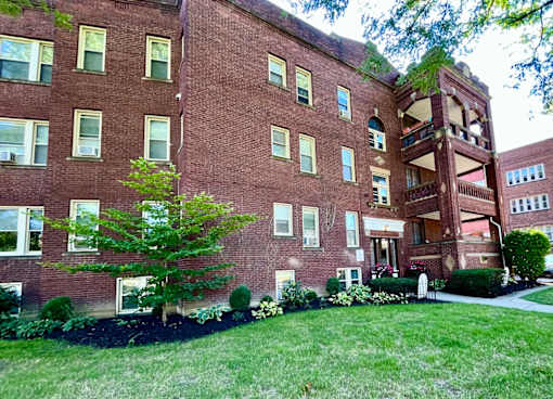 A red brick building with a tree in front at Integrity Cleveland Heights Apartments, Cleveland Heights, 44106