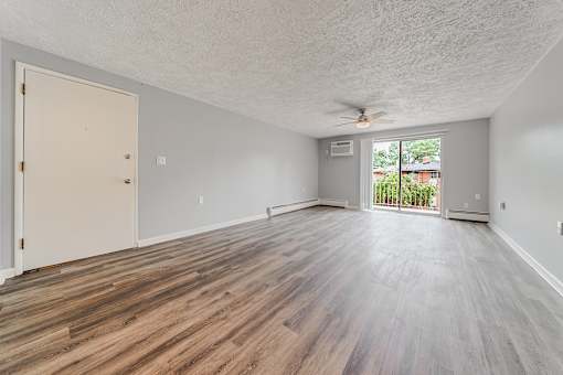 A room with a wooden floor and a ceiling fan. at Integrity Berea Apartments, Ohio, 44017