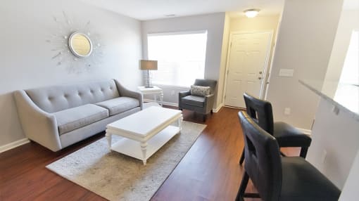 Townhome living room with hardwood floor.