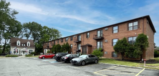 Apartment exterior and parking area.