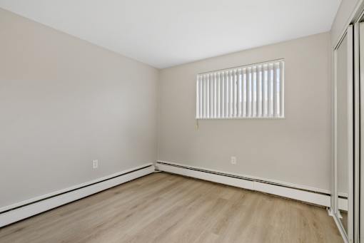 Bedroom with a high window.