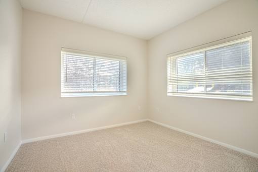A room with two windows and carpeted floor t Atrium in The Village,  44122