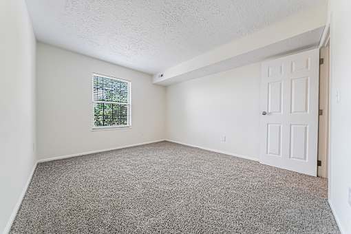 Carpeted bedroom option at Hunt Club Apartments, Ohio