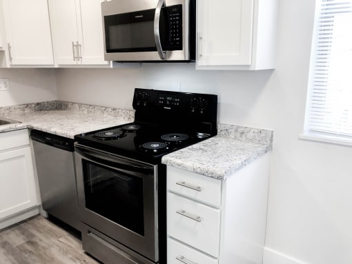 Right side of renovated kitchen at Eagles Landing Apartments, Integrity Realty, Kent, OH, 44240