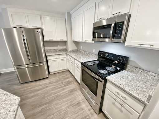 White Kitchen Cabinetry Remodel at Old Green Place Apartments, Integrity Realty LLC, Beachwood, 44122