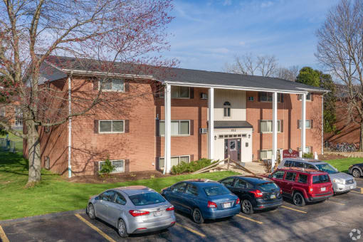 Typical building with ample parking at Ryan Place Apartments, Integrity Realty, Kent, Ohio