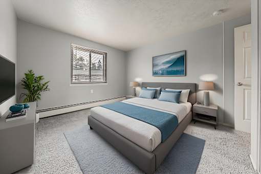 A bedroom with a large bed and a television. at Integrity Berea Apartments, Berea, 44017